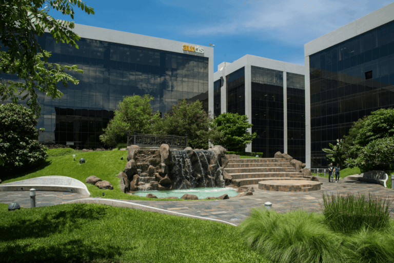 Auxis headquarters office location with green spaces