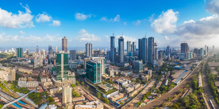 Aerial view of Mumbais Lower Parel skyline showcasing modern architecture and urban development in the context of outsourcing challenges