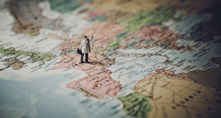 A person analyzing clouds representing cloud services and outsourcing strategies