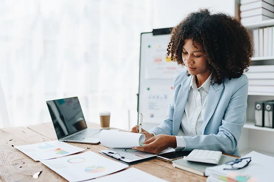 accounts receivable specialist reviewing deduction claims data