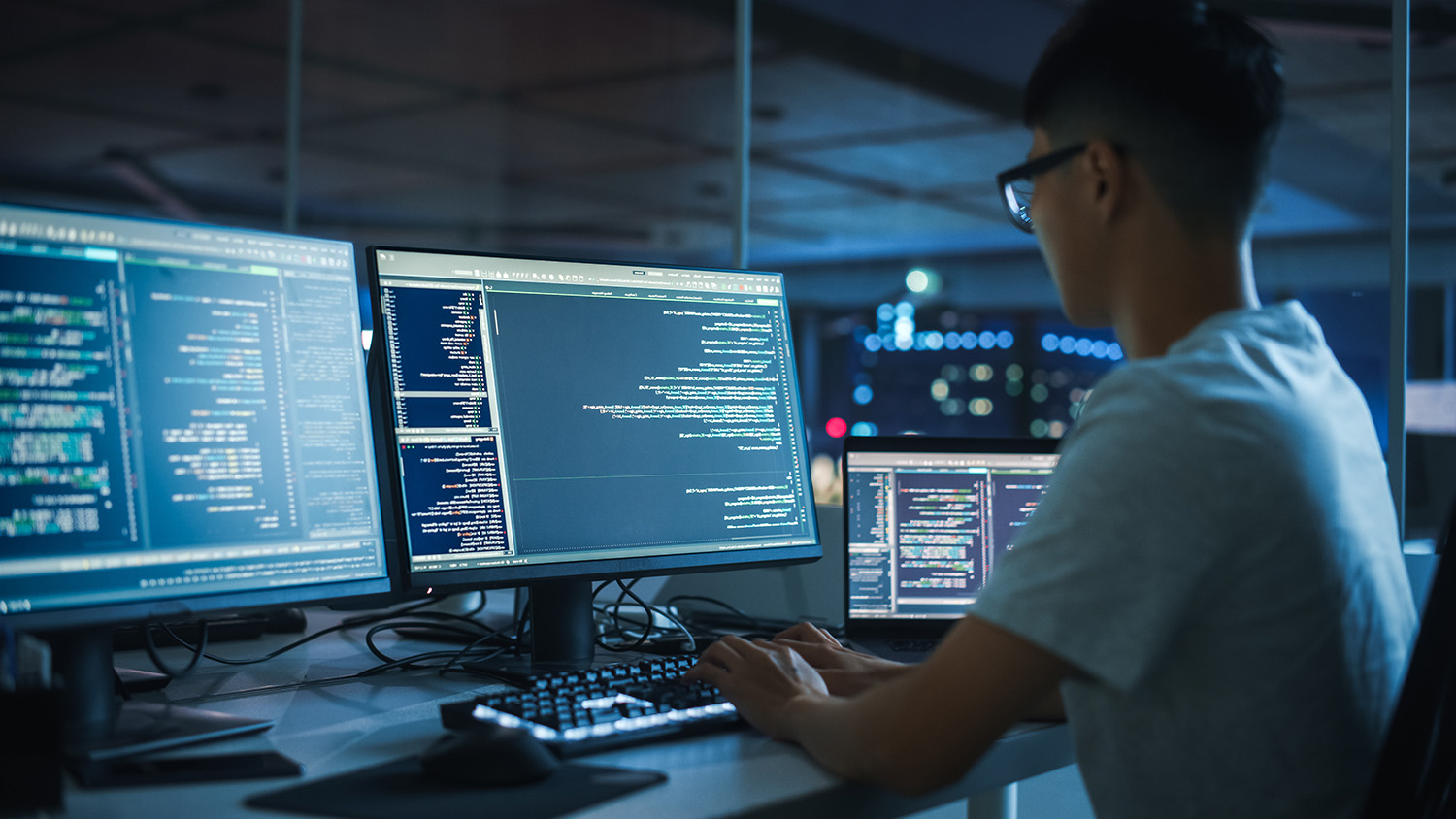 IT technician working on outsourced infrastructure in a data center