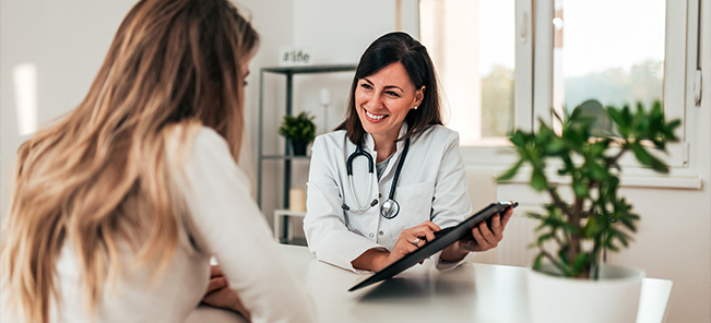 Medical Specialist Talking to Her Patient