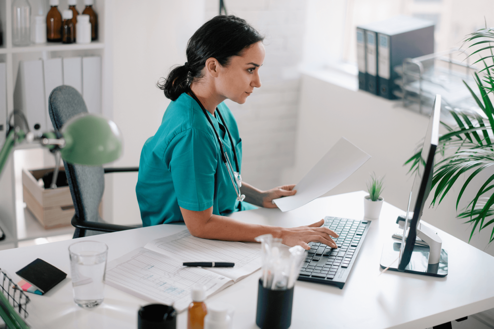 Healthcare professionals leveraging technology for revenue cycle management and automation