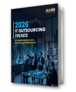 Business professionals discuss 2026 IT outsourcing trends in a modern office highlighting AI and hybrid delivery solutions