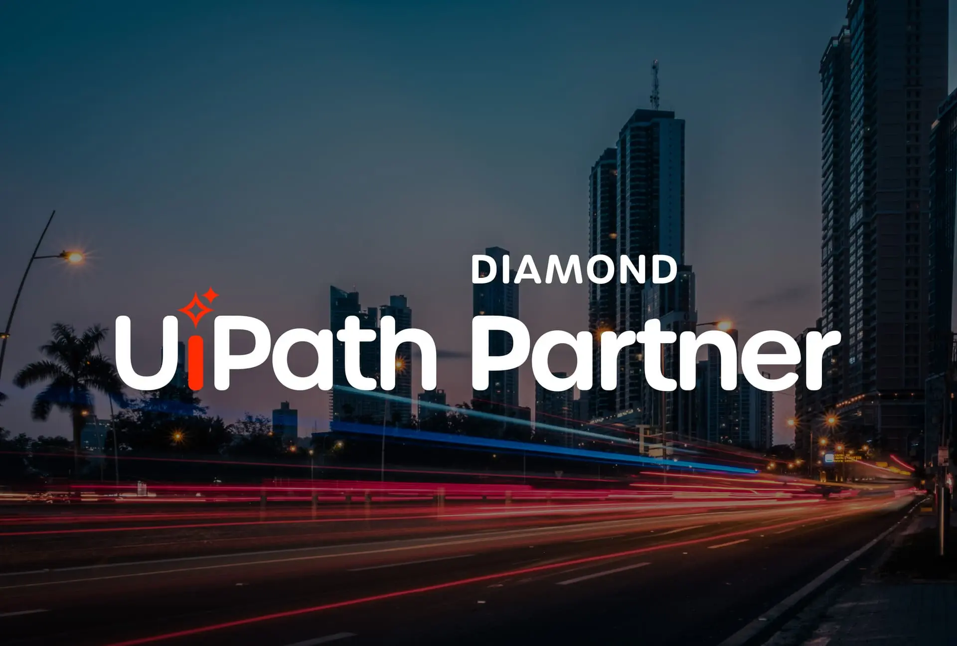 Urban skyline at dusk featuring the UiPath logo highlighting its status as a Diamond Partner in automation solutions
