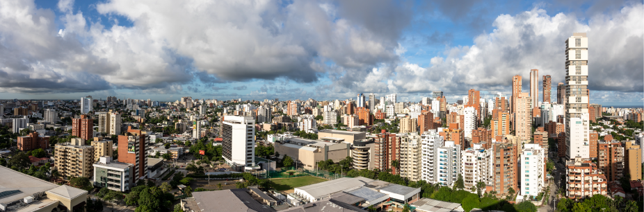 BAQ - Auxis Panoramic view of a vibrant Colombian city showcasing modern architecture and urban development ideal for nearshore opportunities
