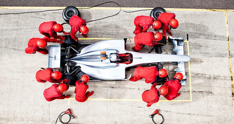 Racing team working at pit stop