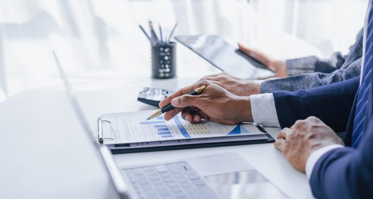 Using tablet pc, Consultant between bookkeepers and accounting lawyer consultation about asset, balance sheet, stock market statistics and yearly tax law, protect business from bribery.