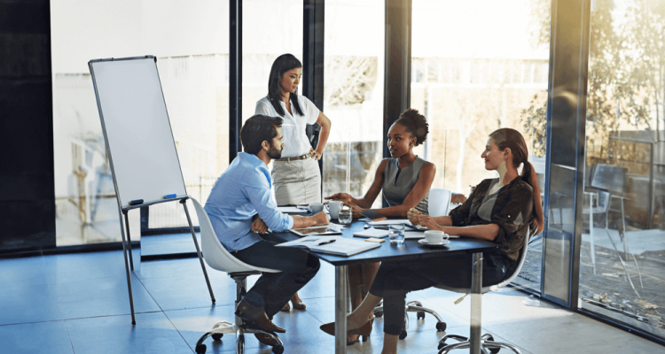 Professionals discussing strategies to improve working capital and cash flow optimization.